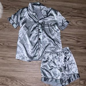 XS worn once for Christmas. Chrome blue silky two piece PJ set